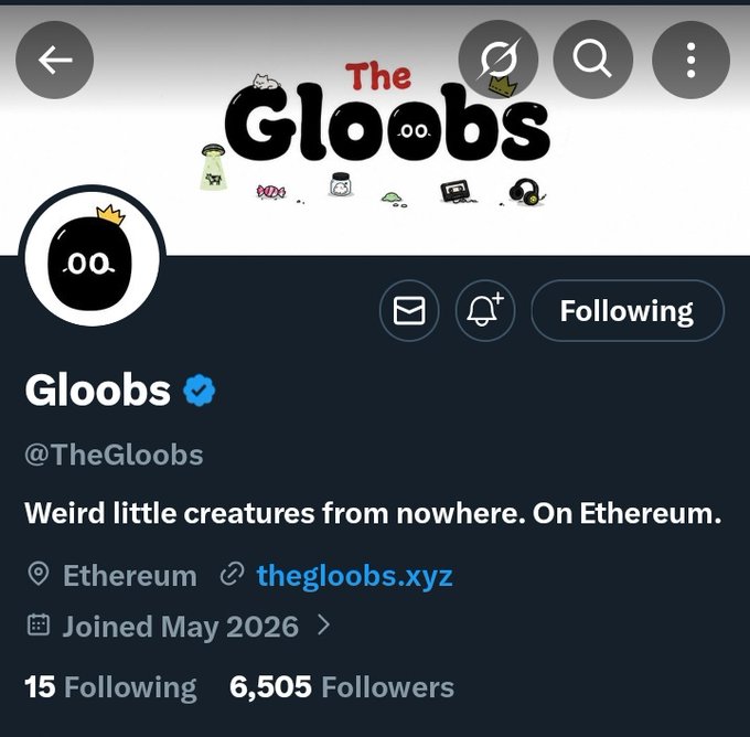 The image features a social media post from TheGlobs, an account that has been tagged with the hashtag #TheGlobs. The post includes a meme featuring a black character with googly eyes and a crown, accompanied by text about a project called "TheGloobs NFT". The post also mentions that there are 15 followers who have liked the post, and it was posted on May 8, 2016 at 6:05 AM.