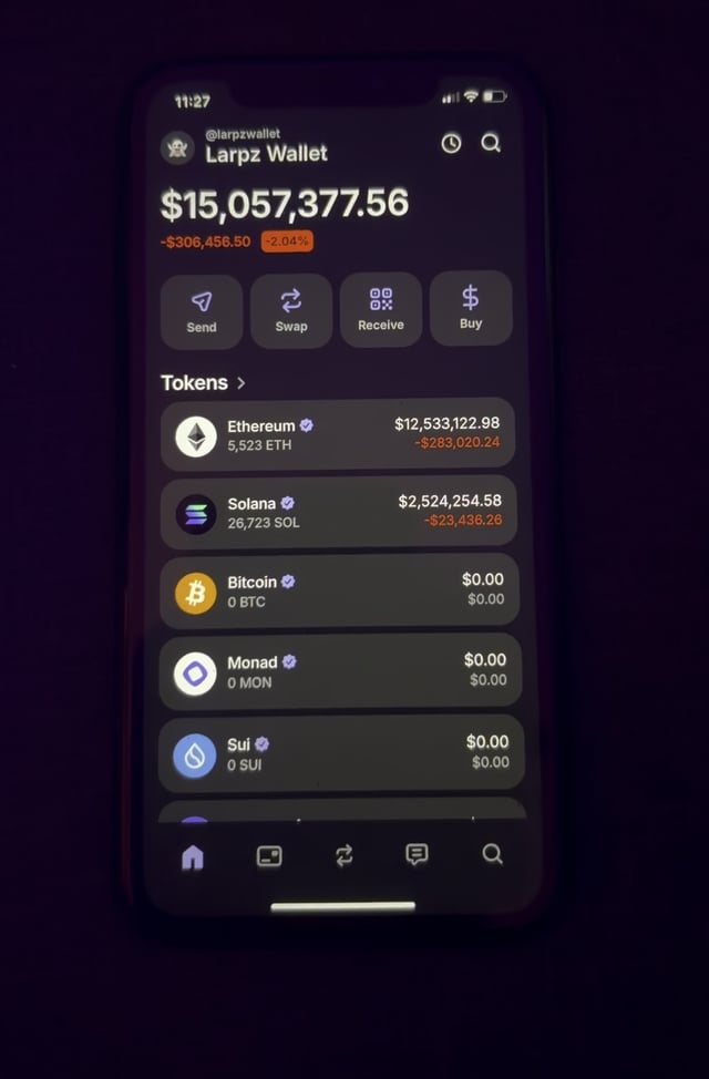 The image shows a cell phone screen displaying various cryptocurrency transactions. There are several Bitcoin transactions, along with other digital currency exchanges such as Ethereum and Solana. The phone's display also includes information about the wallet balance, including the amount of money held in each exchange. The background is dark, which contrasts with the bright screen and makes it easy to read the details on the phone's display.