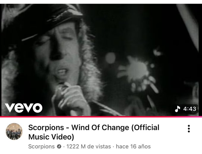 The image features a music video for the band Scorpions, which has been translated into Spanish. The video showcases the band members singing along with the song "Wind of Change" by the Scorpions. The caption below the video reads "Vero scorpions - Wind Of Change (Official Music Video)".