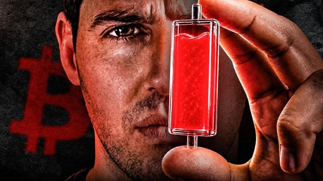 The image features a man holding up a small glass container filled with red liquid, possibly blood or another type of bodily fluid. The background includes a dark gray color scheme, which contrasts with the bright red liquid inside the container. The text "S&P500 Divergence" is visible in the image, suggesting that this could be related to a discussion about the technical strategy behind Bitcoin.

The man holding up the glass container appears to be wearing glasses and has a beard. The image also contains some text that reads "Bitcoin", which further supports the connection between the red liquid and Bitcoin.