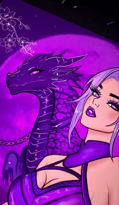 A digital illustration features a striking purple-toned scene with a glossy purple dragon perched on a woman's shoulder, set against a vibrant magenta moon with cherry blossoms in the upper left corner. The artwork's bold purple palette and mystical aesthetic align with the artist's announcement of their new creative drop scheduled for 03.09.26.