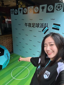 A woman poses in front of a green backdrop reading "午夜足球派对" (Midnight Football Party) hosted by Bitget, pointing to a large black and teal soccer ball, with the accompanying post promoting a viewing party for the England vs. Congo match featuring beer and friends.