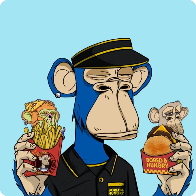 A colorful cartoon illustration of a blue Bored Ape-style character wearing a black cap and uniform, holding a box of fries and a 'Bored & Hungry' branded burger.