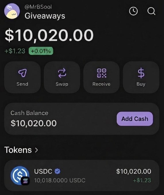 The image shows a cell phone screen displaying a message about a cash balance of $10,000.00. The text on the screen reads "Add Cash Balance", indicating that someone has added money to their account. There are also several buttons on the screen, including one labeled "Receive" and another labeled "Send". Additionally, there is a small image of a wallet icon next to the "Receive" button.