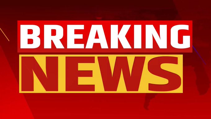 A red 'BREAKING NEWS' graphic with white and yellow text on a dark red background.