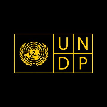 The UNDP (United Nations Development Programme) logo in yellow/gold against a black background, featuring the UN emblem and the letters 'UN' and 'DP'.
