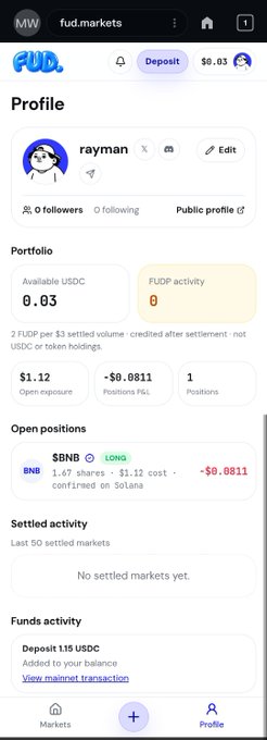 A mobile interface for the 'fud.markets' platform showing user 'raymanX' profile with an available USDC balance of $0.03, an open LONG position on BNB at $1.12 cost showing -$0.0811 P&L, and a Deposit 115 USDC notification.