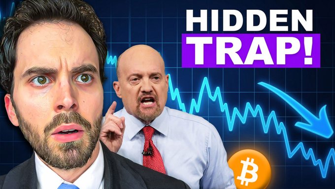 The image features a man, presumably an expert or someone knowledgeable about Bitcoin, with a pair of funny looking eyes and a mustache giving him the appearance of a businessman who has made money from investing in Bitcoins. The background shows a graph that displays the price of Bitcoin falling, which adds to the negative atmosphere surrounding Bitcoin. There is also an "HIDDEN TRAP!" text overlay on top of this scene, suggesting that there might be some hidden trick or deception related to Bitcoin that could potentially catch people off guard.