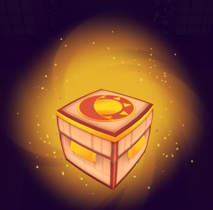 An illustrated treasure chest with a glowing golden aura, decorated with a red and yellow sun/star emblem on its lid, set against a dark purple background with floating magical sparkles, suggesting a reward or in-game prize.