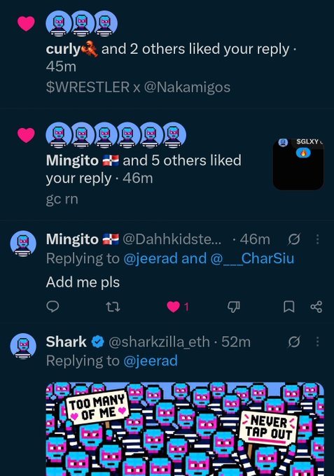 A screenshot of a social media thread in dark mode, showing a reply to '@jeerad' that has garnered likes from users named 'curly', 'Mingito', and 'Shark' (@sharkzilla.eth), featuring a cartoon image with signs reading 'TOO MANY OF ME' and 'NEVER TAP OUT'.