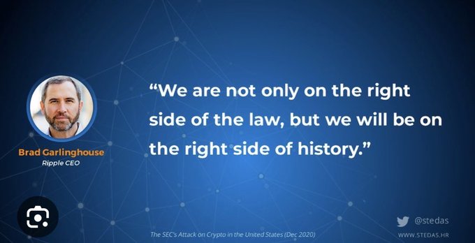 The image features a man with a beard, wearing glasses, sitting behind a computer screen displaying a blue background with white text that reads "We are not only on the right side of the law but we will be on the right side of history". The caption below the image identifies the person as Brad Garlinghouse and mentions an article about Bitcoin.