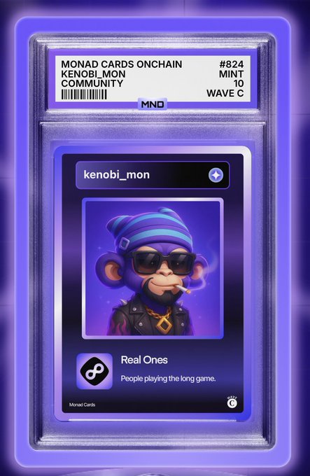 A graded-style digital card labeled 'MONAD CARDS ONCHAIN #824' featuring a 3D-rendered purple monkey character named 'kenobi_mon' wearing sunglasses, a beanie, and gold chain, with a 'Real Ones' description.