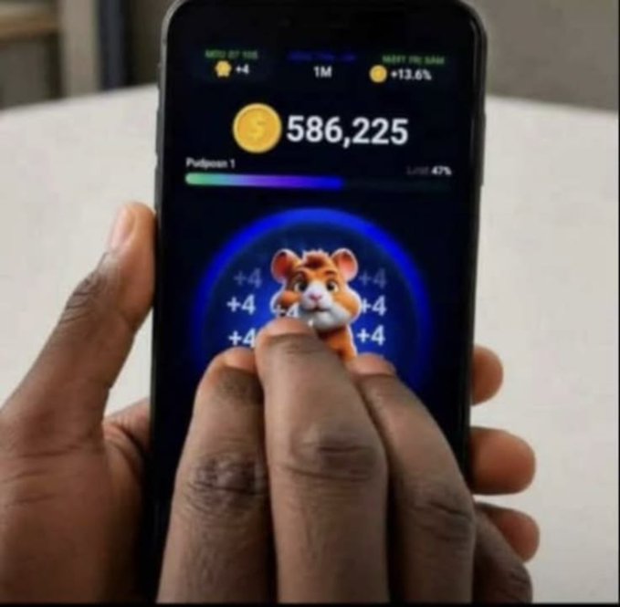 A person holding a smartphone displaying a tap-to-earn crypto game featuring a hamster character with a balance of 586,225 coins and daily income of +13.6%.