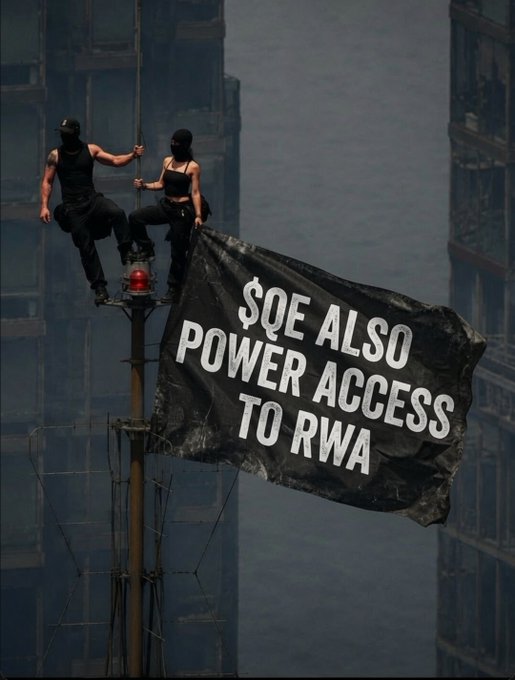 Two masked figures in black sit atop a tall pole, holding a black flag that reads '$QE ALSO POWER ACCESS TO RWA' against a dark, cloudy skyline.