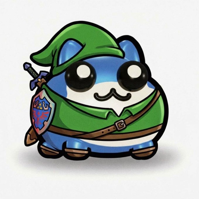 A chibi-style sticker of a round blue and white cat wearing a green tunic, pointed hat, and carrying a sword and Hylian Shield—clear references to Nintendo's "The Legend of Zelda" character Link. The image relates to the post by featuring Link as a costume for "$toby," parodying the popular character in the Octoby SZN series.