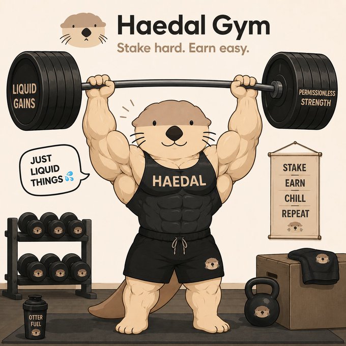 The image features an otter lifting a barbell with both hands, showcasing its impressive strength. The otter is depicted wearing black shorts and a black tank top while holding the barbell above its head. In addition to the main scene, there are several other objects in the background that include a water bottle, a towel, and a weight bench. The image also includes text that reads "G-haedal Have a productive day on sui".