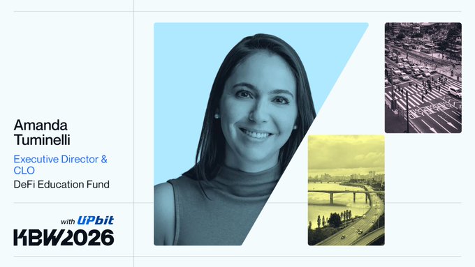 A promotional slide for KBW2026 with UPbit featuring Amanda Tuminelli, Executive Director & CLO of DeFi Education Fund, shown alongside urban imagery.