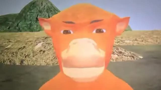 A low-resolution 3D rendering of an orange monkey or ape-like character face against a simple landscape background with a mountain.