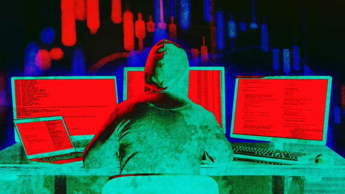 A hooded figure sits before multiple monitors displaying red code, bathed in a red and teal glow that evokes cybercriminal activity. The imagery visually represents the alleged hacker behind Ostium's $18,000,000 vault exploit, who converted stolen USDC into ETH and dispersed funds across multiple wallets.