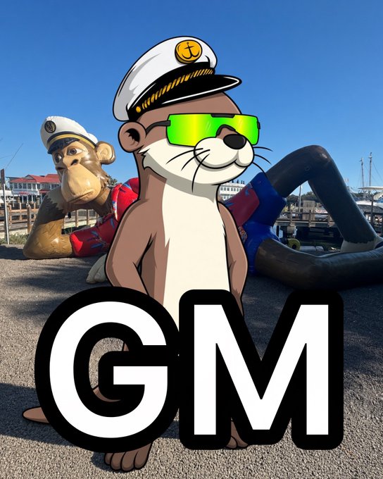 A cartoon otter wearing a white captain's hat and green reflective sunglasses standing in front of a monkey statue, with large white 'GM' text overlaid on the image.