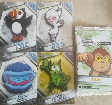 A collection of 'Topps Chrome' trading cards features characters 'DAUGHTER PUFFIN', 'ASHIRA ALPACA', 'CALM CLAM', and 'LOYAL LOBSTER', alongside a sealed pack showing a monkey character and '4 CARDS' from the 2026 Vaulted set.