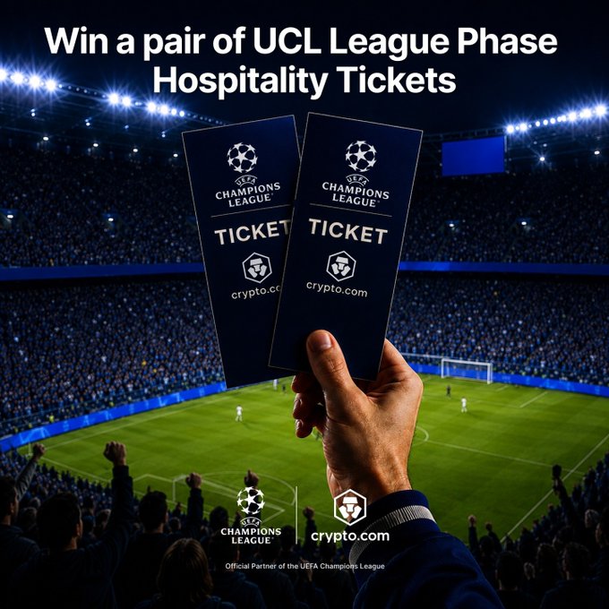 A hand holds up two UEFA Champions League "TICKET" cards branded with crypto.com logos against the backdrop of a packed stadium. The bold headline reads "Win a pair of UCL League Phase Hospitality Tickets," promoting a prediction contest where fans guess opponents to win the VIP experience.