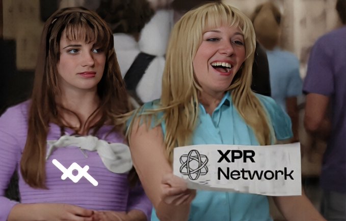 The image features two women standing next to each other with a sign that says "XPR Network" written on it. The text on the sign reads, "With XPRNetwork, it will be the summer of shipping all year long! The Metallicus community is one of the most popular in crypto right now, and there are already so many pathways to build and earn within the ecosystem, users can ship their $XPR $LOAN". One woman has blonde hair while the other has brown hair. They both appear to be smiling at each other as they stand together with the sign.