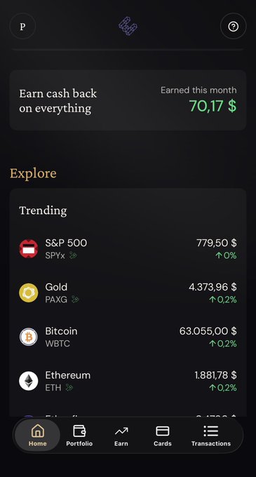 Mobile app screen showing a cash back balance of $70.17 and trending investments including S&P 500 (SPYx) at $779.50, Gold (PAXG), Bitcoin (WBTC), and Ethereum (ETH).