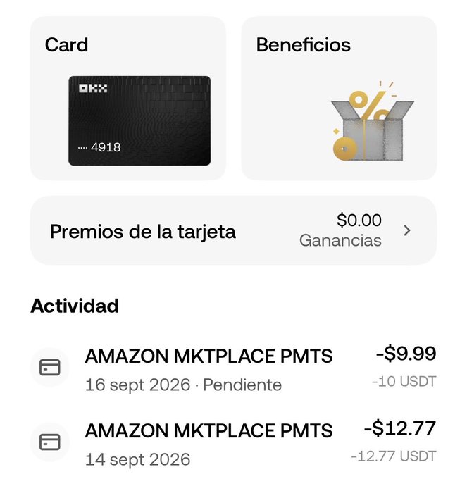 A Spanish-language OKX crypto card interface showing card details ending in 4918, $0.00 in card rewards, and activity log with Amazon Marketplace charges of -$9.99 USDT and -$12.77 USDT.
