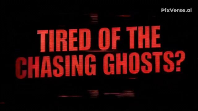 The image features a large, red sign with the words "Tired of the chasing ghosts?" written in bold letters against a black background. The text appears to be in a foreign language or script that is not easily recognizable. The focus of the image seems to be on the content and message of the sign rather than its visual appeal.