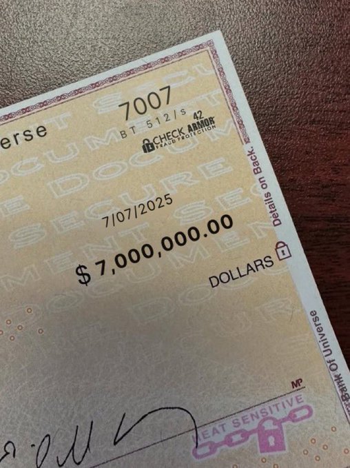 A $7,000,000 CheckArmor security check dated 7/07/2025, number 7007, in U.S. dollars, resting on a dark surface.