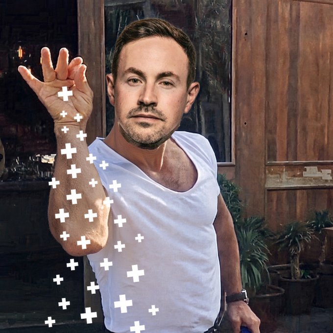 A digital illustration shows a man in a white tank top making an 'OK' hand gesture, with animated white plus-shaped sparkles trailing down from his hand.