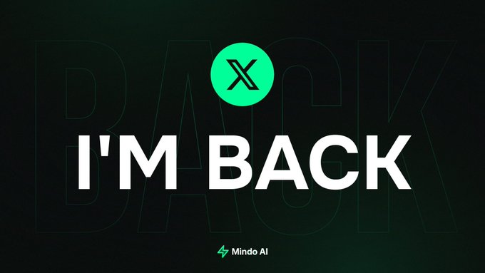 The image shows a dark background with bold white text reading "I'M BACK," accompanied by the Mindo AI logo (a green circle with an X) and the "Mindo AI" name at the bottom, with "BACK" subtly outlined in the background.

This graphic visually reinforces the post's announcement of Mindo AI's return to X, highlighting the "I'm Back" message as the central theme while celebrating the community's continued engagement during the account's absence through the Mindo × Tria campaign.