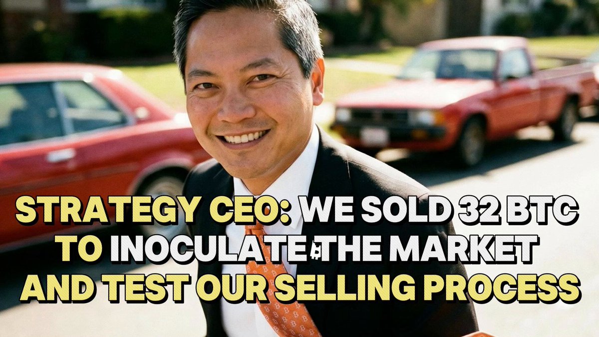 The image features a man wearing a suit, standing next to two cars parked side by side. The text above him reads "Strategy CEO: We Sold 32 BTC to Inoculate the Market and Test Our Selling Process Strategy CEO Phong Le @phongle said in a June 11 interview with CNBC that the company sold 32 BTC mainly to inoculate the market and test its internal selling process". This suggests that the man is likely discussing or promoting an investment strategy related to cryptocurrency, specifically Bitcoin.