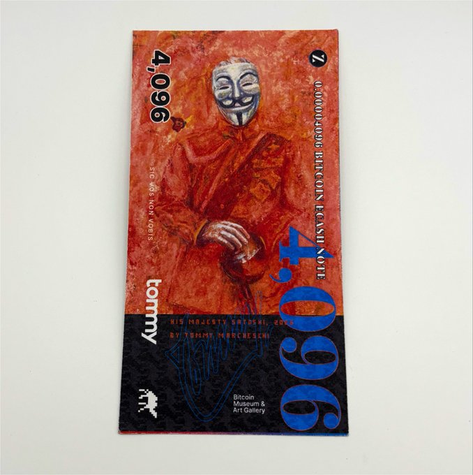 A physical Bitcoin Cash 'bcash' denomination note worth 4.096 features artwork of a masked figure, labeled 'STC 4096 NOBEL NOTE' and issued by the 'Bitcoin Museum & Art Gallery.'