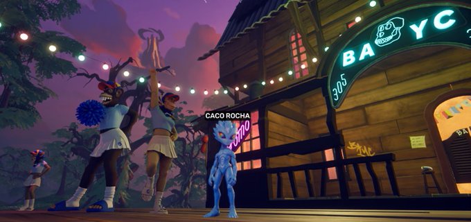 A screenshot from a video game featuring a blue alien character labeled 'CACO ROCHA' standing in front of cheerleaders and a building with neon signs reading 'BAYC' and '305'.
