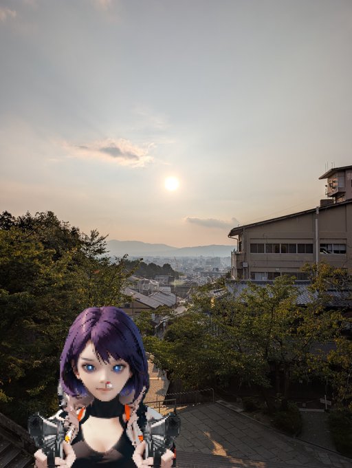 A photograph of a sunset over a Japanese-style hillside town, with a superimposed anime character featuring purple hair in the bottom left corner.