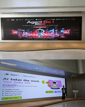 Two photos from what appears to be a conference or event, showing large digital screens/billboards: the top displays 'AgentGo! AI agents for everyone' with race cars, and the bottom shows a presentation slide titled 'AI takes the work. AgentGo! Rise the peak!' listing platform features.