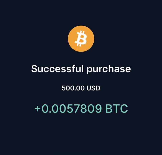 A successful Bitcoin purchase confirmation screen showing 500.00 USD converted to +0.0057809 BTC.