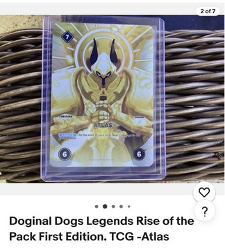 A collectible trading card titled "ATLAS" from the "Doginal Dogs Legends Rise of the Pack First Edition" TCG pack.