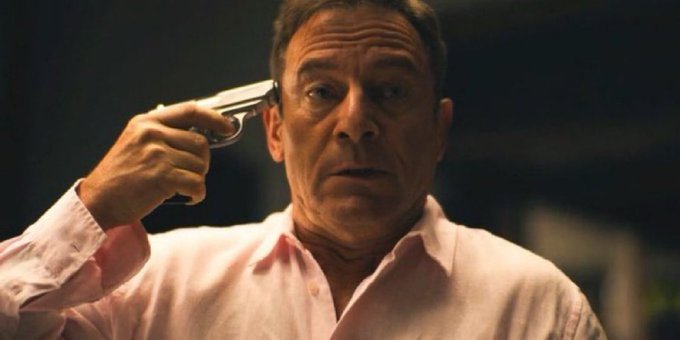 The image shows a man pointing a gun to his own head, mirroring the sentiment expressed in the post that the "Saylor gimmick" needs to end due to potential Bitcoin losses.
