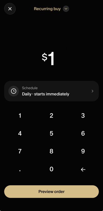 A mobile app screen showing a recurring buy interface for $1 with a daily schedule that starts immediately, featuring a numeric keypad and a 'Preview order' button.