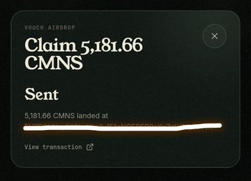 A dark-themed digital voucher notification states "VOUCH AIRDROP: Claim 5,181.66 CMNS - Sent - 5,181.66 CMNS landed at" followed by a redacted white line and a "View transaction" link.