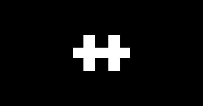 The image features a black and white flag with an X symbol in the center. The flag has been altered by someone who has added a new hashtag (#HASH'D) to the bottom of the X symbol, making it appear as if the first HASH'D article is now onchain. This alteration gives the impression that the original flag was replaced or modified with the new hashtag.