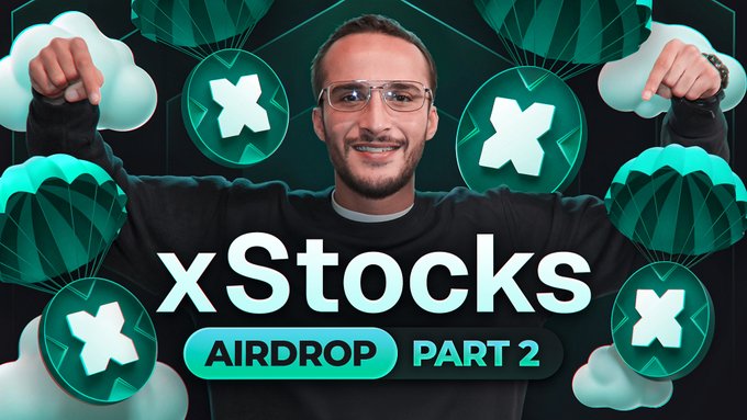 The image features a man standing against a black background, holding up his arms with a big smile on his face. The text "xStocks" is written above him, indicating that this is part of an educational video series about cryptocurrency and its various aspects. The title "Airdrop Part 2" suggests that the video is related to the process of receiving rewards for participating in an initial coin launch (ICO).