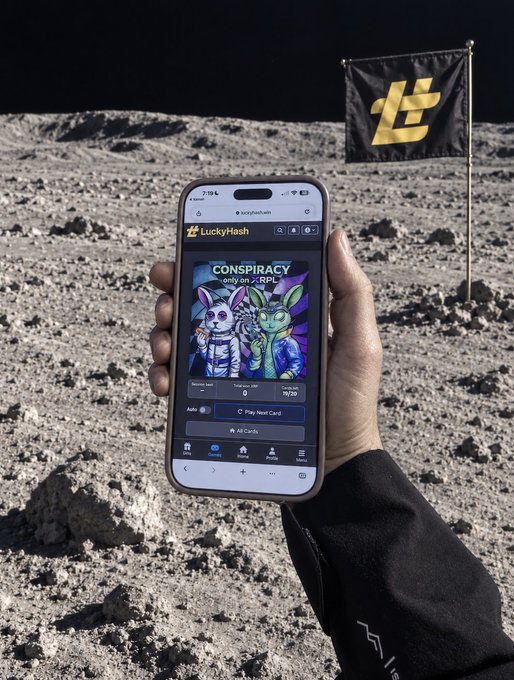 A hand holds a smartphone displaying the 'LuckyHash' app with a 'CONSPIRACY' NFT page, while a flag with a gold 'L' logo stands in a lunar landscape.