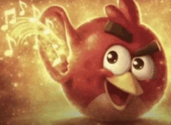 A red Angry Birds character with an open beak and musical notes floating nearby, set against a glowing golden background.