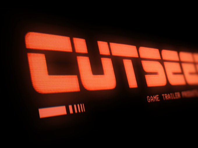A glowing red LED screen displays the word 'cutsee' with 'GAME TRAILER' written underneath, possibly for a YouTube video title.