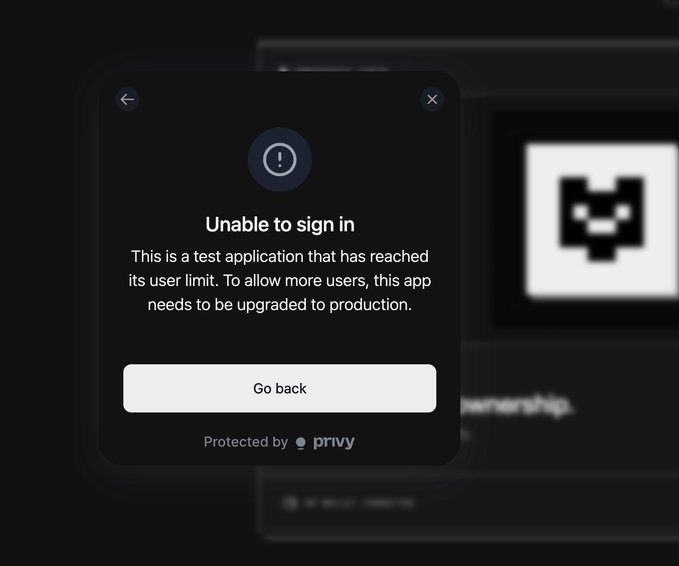 An error dialog box displaying 'Unable to sign in' with a message that the test application has reached its user limit and needs to be upgraded to production, protected by Privy.