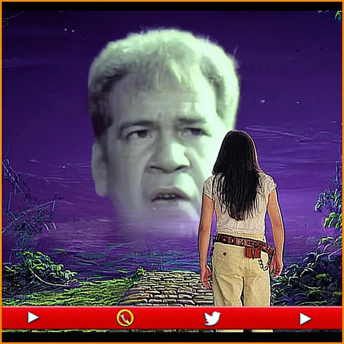 A surreal image featuring a giant floating head of an older man with white hair against a purple sky, while a woman with long dark hair stands on a stone path looking up at it, with social media navigation icons at the bottom.